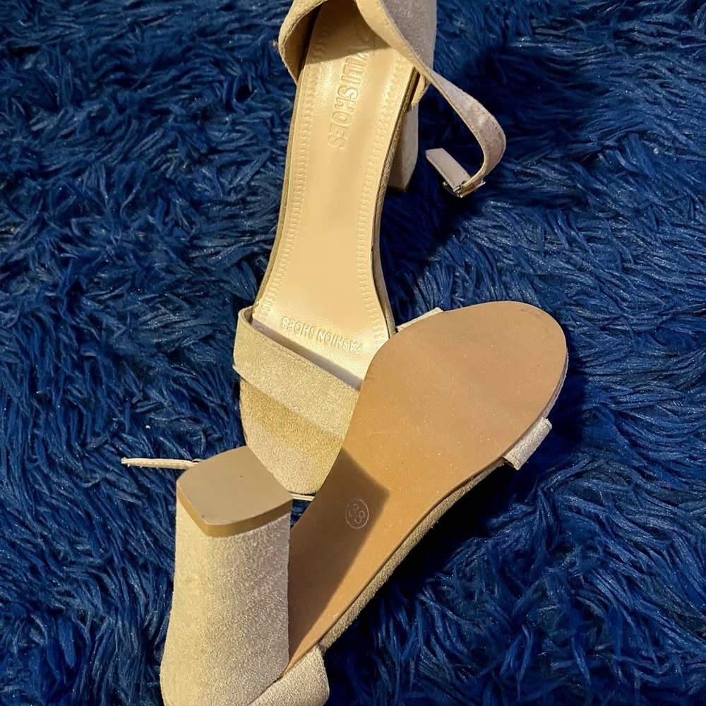 *NEVER WORN* Beige sandals with an adjustable strap. Size Women 38 (7.5) NWT